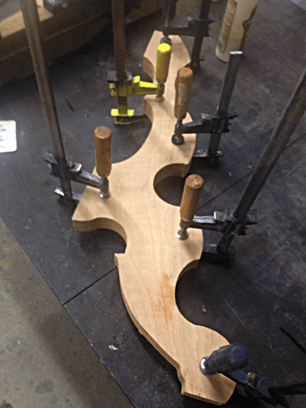 The 2 halves of the legs being glued together.